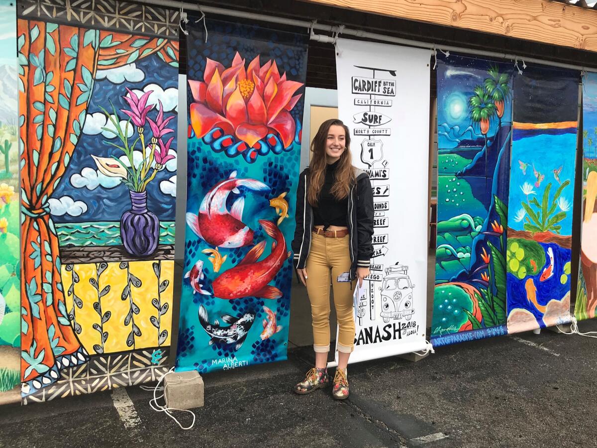 Marina Alberti with her Arts Alive banner.