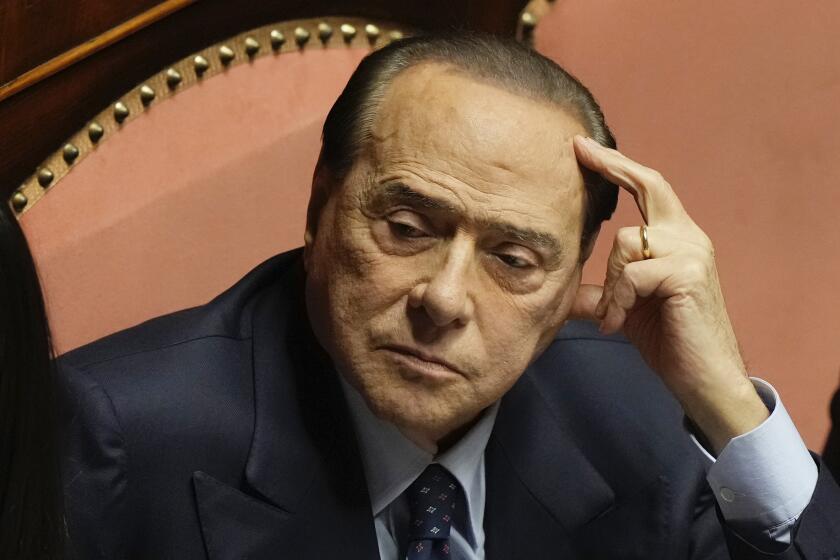 FILE - Forza Italia party leader Silvio Berlusconi at he Senate, in Rome, on Oct. 26, 2022. Former Italian Premier Silvio Berlusconi was hospitalized Wednesday, April 5, 2023, with apparent respiratory problems, Italian media reported. The 86-year-old three-time premier was in intensive care at Milan’s San Raffaele hospital, the clinic where he routinely receives care, LaPresse news agency, Sky TG24 and Corriere della Sera reported, without citing sources. (AP Photo/Andrew Medichini)