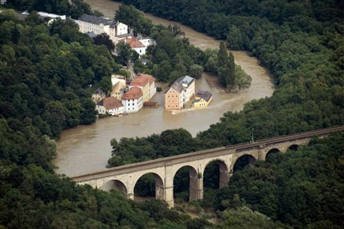 An aerial view of the Neisse river near Goerlitz, Eastern Germany, photographed on Sunday Aug. 8, 2010. The flooding in central Europe has struck an area near the borders of Poland, Germany and the Czech Republic. (AP Photo/ddp/ Jens Schlueter)