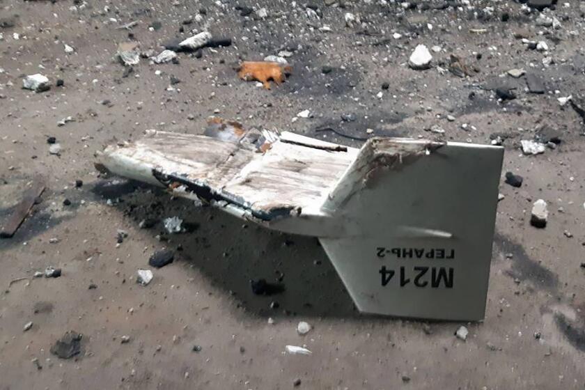 FILE - This undated photograph released by the Ukrainian military's Strategic Communications Directorate shows the wreckage of what Kyiv has described as an Iranian Shahed drone downed near Kupiansk, Ukraine. As protests rage at home, Iran's theocratic government is increasingly flexing its military muscle abroad. That includes supplying drones to Russia that now kill Ukrainian civilians, running drills in a border region with Azerbaijan and bombing Kurdish positions in Iraq. (Ukrainian military's Strategic Communications Directorate via AP, File)