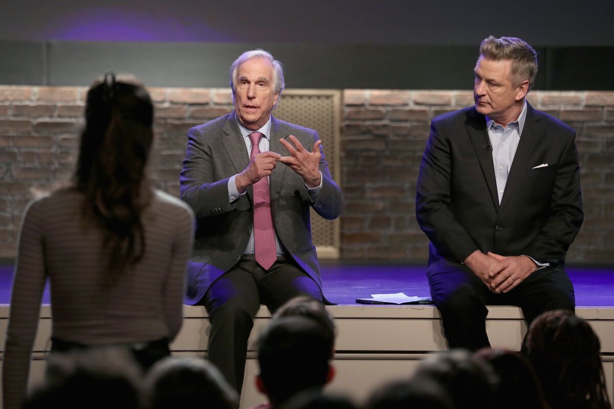 Henry Winkler, left, and Alec Baldwin interact with an audience member during Ovation's "Inside the Actors Studio."