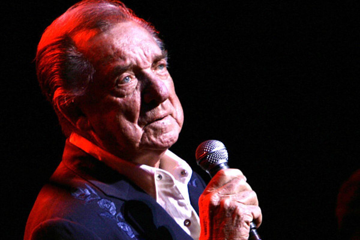 Ray Price performs at the Aladdin Theater for the Performing Arts in Las Vegas. His propulsive 1956 hit "Crazy Arms" helped revolutionize the sound of country music in the 1950s.