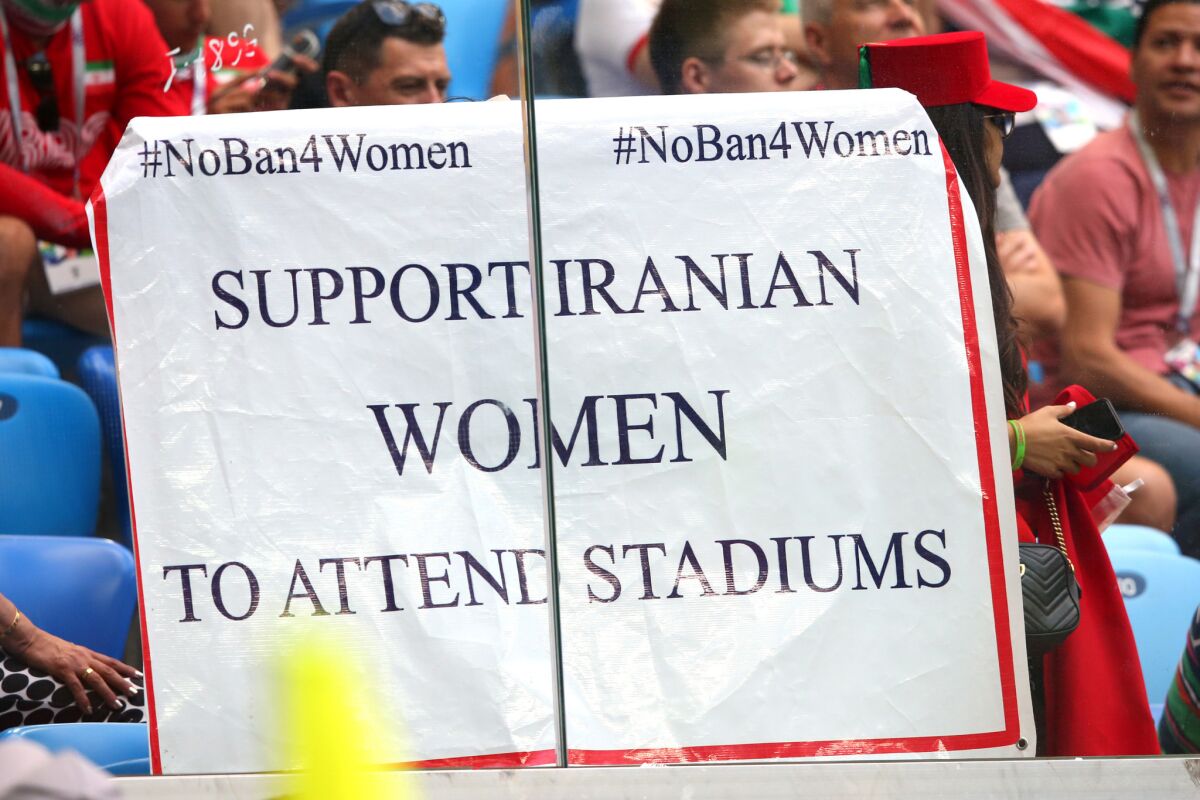 SAINT PETERSBURG, RUSSIA - JUNE 15: A sign is held by fans in support of Iranian women in football during the 2018 FIFA World Cup Russia group B match between Morocco and Iran at Saint Petersburg Stadium on June 15, 2018 in Saint Petersburg, Russia. (Photo by Alex Livesey/Getty Images) ** OUTS - ELSENT, FPG, CM - OUTS * NM, PH, VA if sourced by CT, LA or MoD **