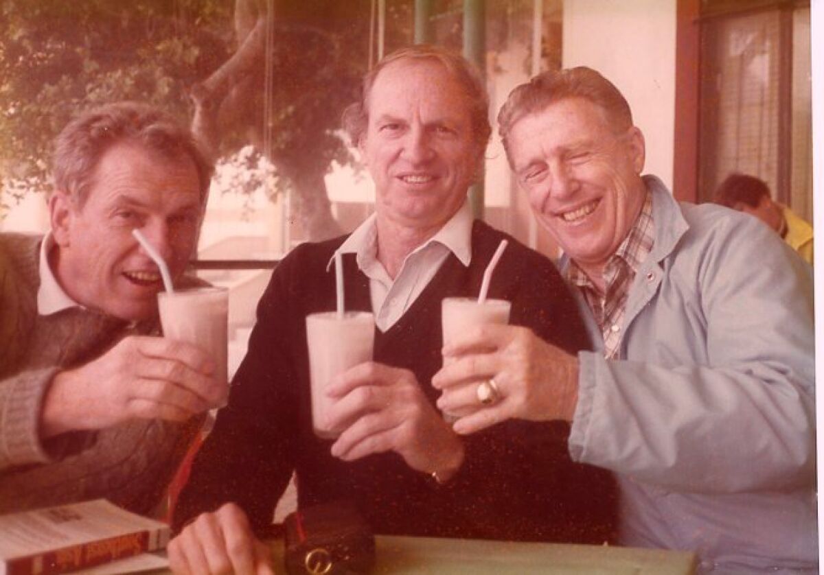 Stan, Ray and Bill toast to middle age with milkshakes.