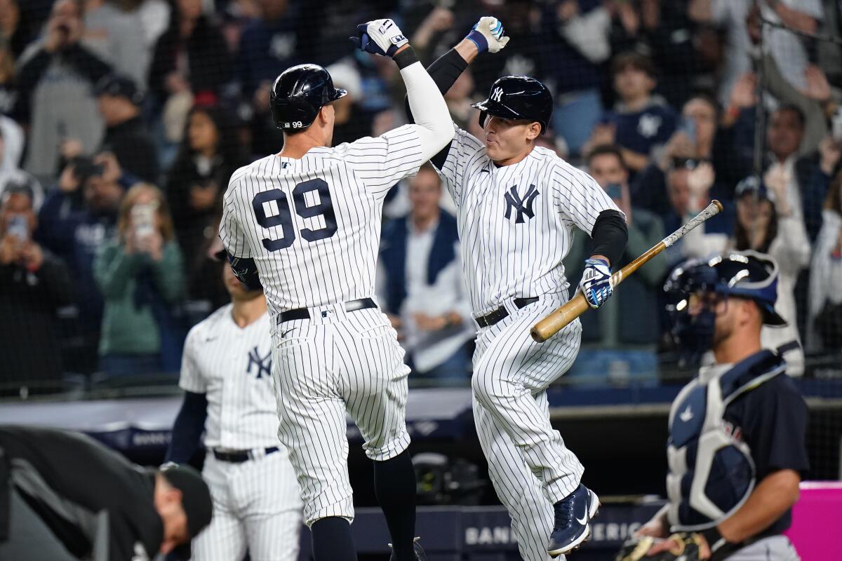 Judge 2 homers, throws out runner, Yanks beat Guardians 4-1 - The