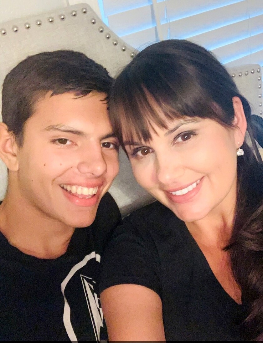 Kristin Selby Gonzalez with her son Jaxson, who lives with autism spectrum disorder.