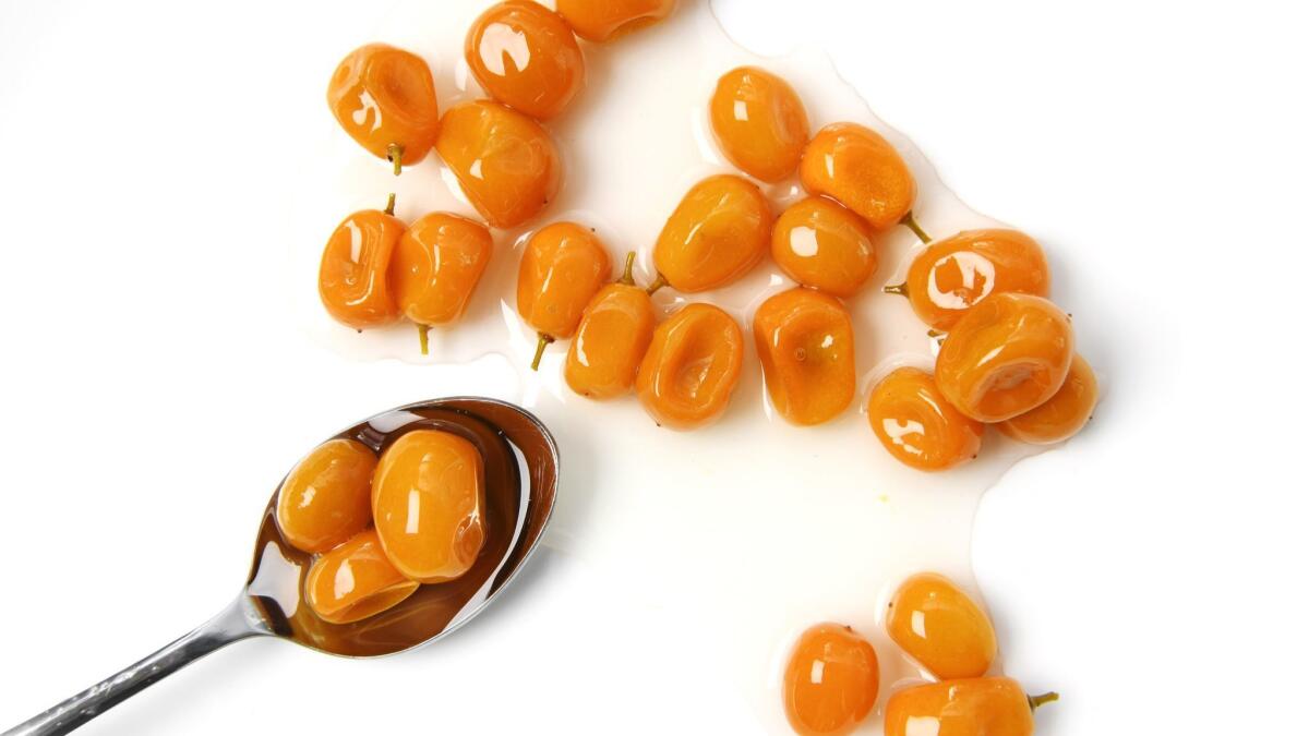 Candied kumquats and syrup are great for stirring into cocktails.