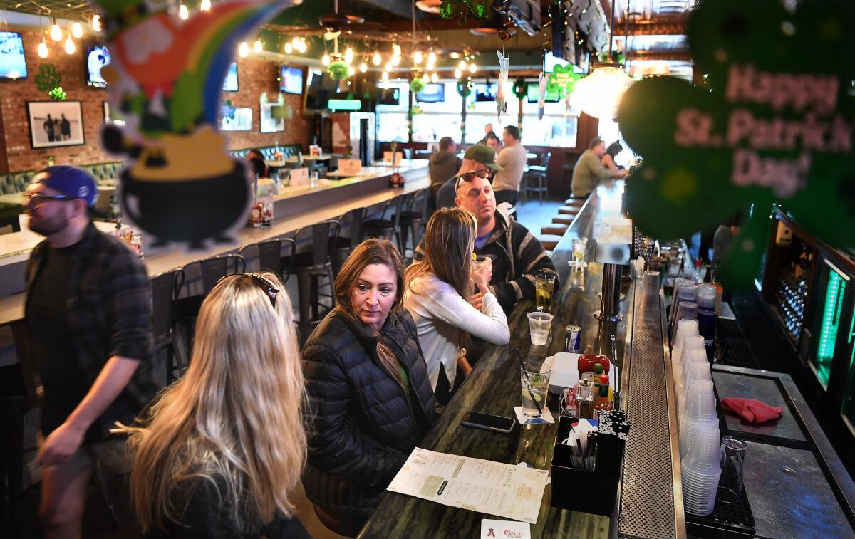 Patrons at a Hermosa Beach bar