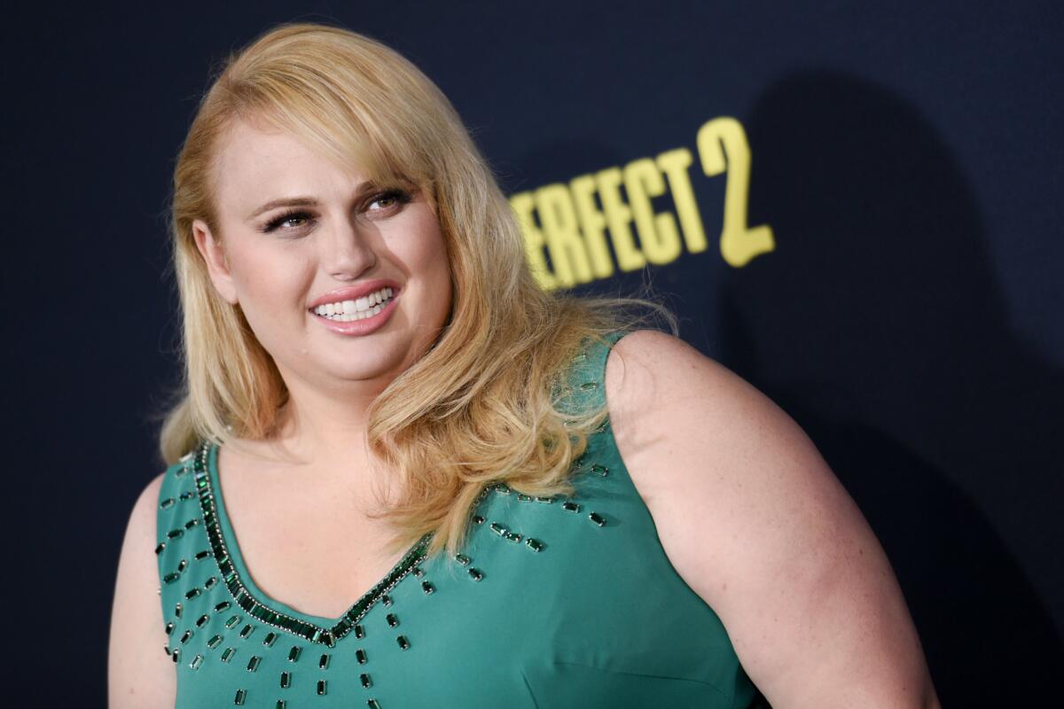 Rebel Wilson may be dating fellow comedian Mickey Gooch Jr., that is, if their social media photos are any indication.