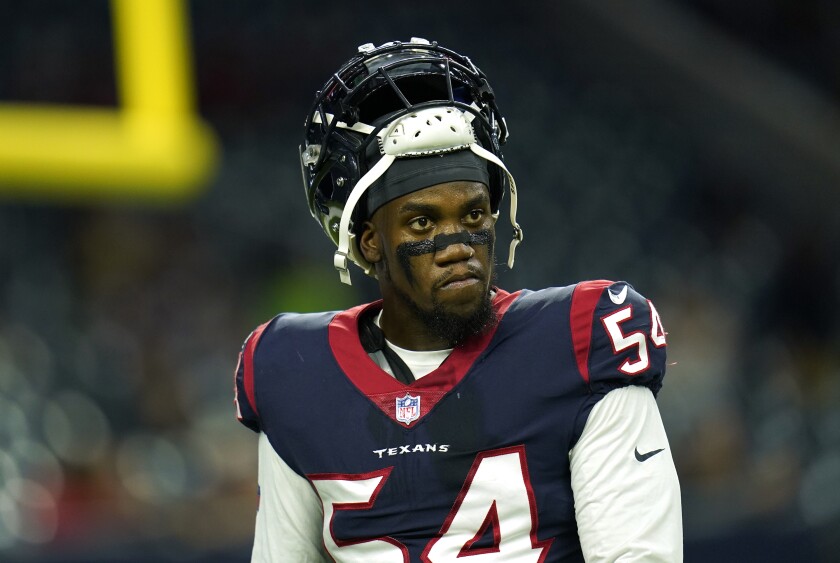 Houston Texans defensive lineman Jacob Martin (54) is seen during pregame warmups before an NFL football game against the Carolina Panthers, Thursday, Sept. 23, 2021, in Houston. The New York Jets and Martin have agreed to terms on a three-year deal worth up to $16.5 million, according to a person with direct knowledge of the contract. The person spoke to The Associated Press on condition of anonymity Thursday, March 17, 2022, because the team had not yet announced the signing.(AP Photo/Matt Patterson)