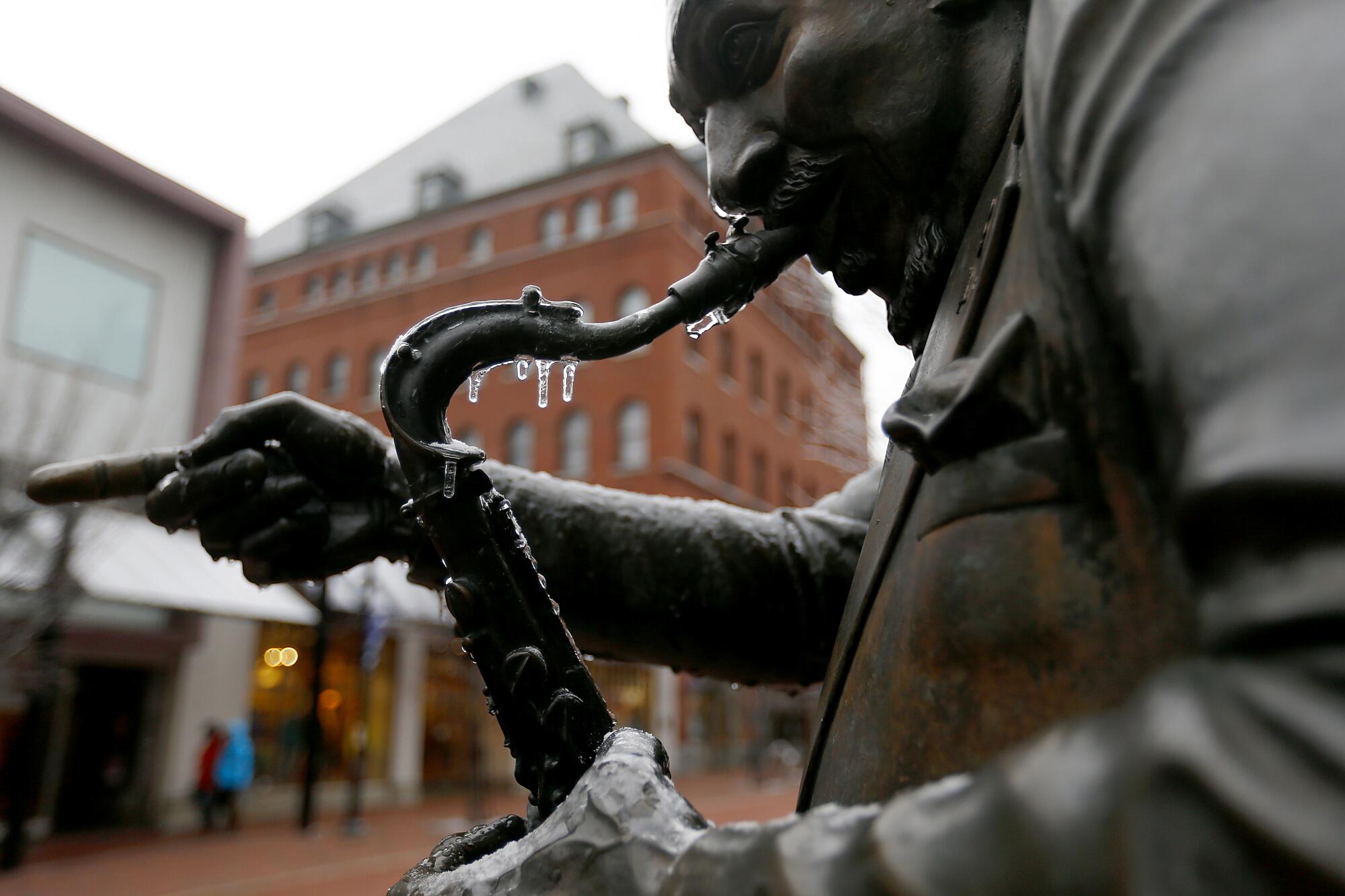Icicles cling to a statue of the late jazz musician Joe Burrell on Church Street, the shopping district in the heart of Burlington. Burrell was a large presence in the Burlington music scene and influenced other local artists, including the 1980s rock band Phish. 