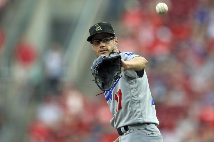 Los Angeles Dodgers' Joe Kelly pitches during a baseball game against the Cincinnati Reds, Saturday, May 18, 2019, in Cincinnati. The Reds won 4-0. (AP Photo/Aaron Doster)