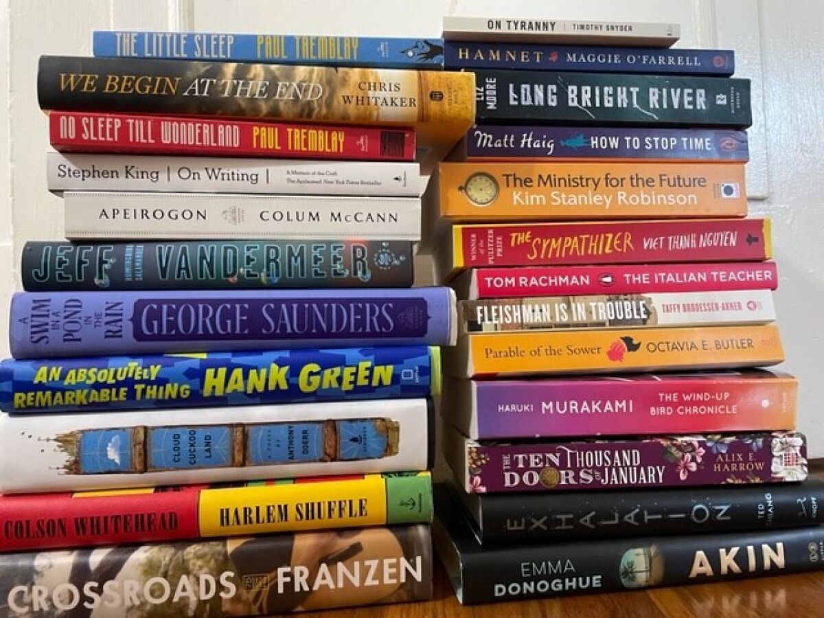 Books that the author began but didn’t finish (along with two that he did) are pictured in a pile in late December.
