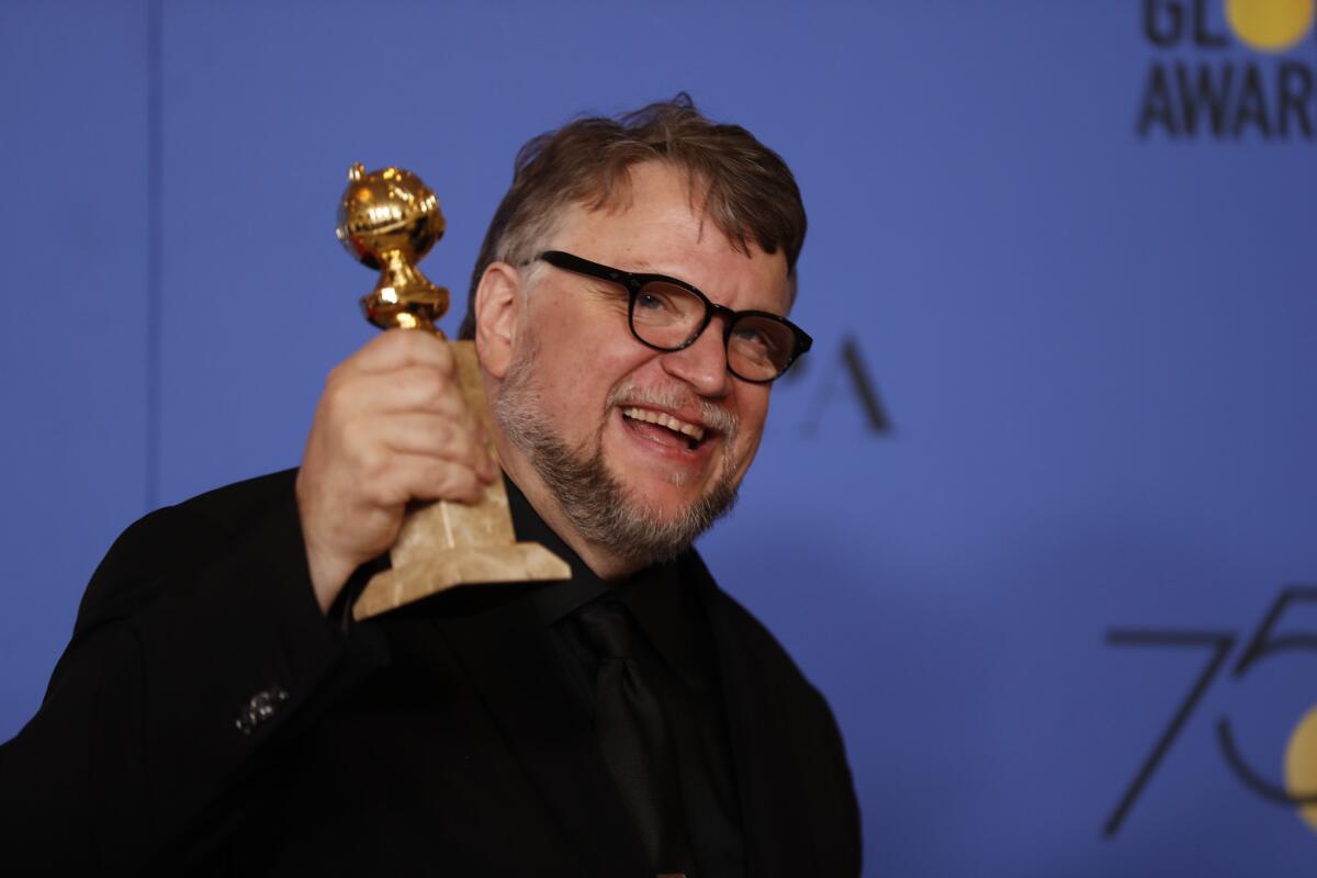 Guillermo del Toro with his Golden Globe award won for directing "The Shape of Water."