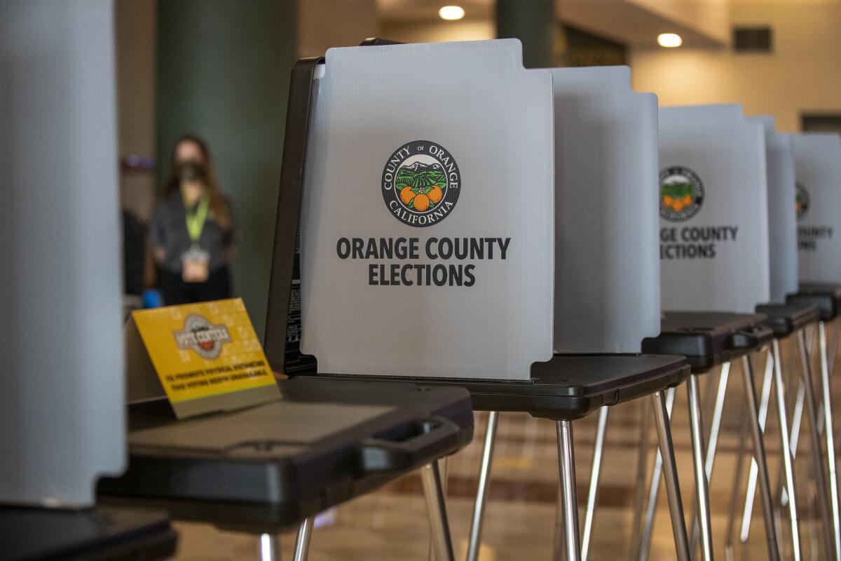 An Orange County Registrar of Voters election worker staffs a "Super Voter Center Site" in Anaheim back in 2020.