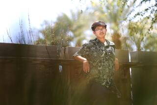 FULLERTON-CA-JULY 19, 2024: David Luong, 18, is photographed at Cal State University Fullerton, where he will attend school this Fall, on Friday, July 19, 2024. (Christina House / Los Angeles Times)