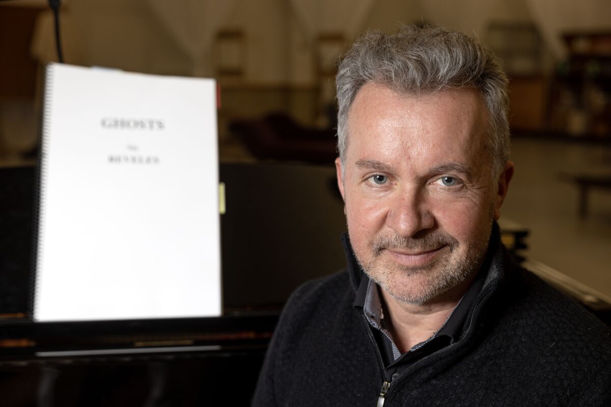 Conductor for "Ghosts" Bruce Stasyna at a rehearsal on March 30 in San Diego.