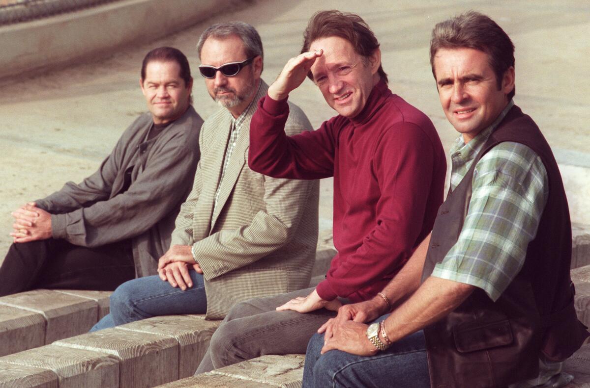 The Monkees, shown during a 1996 30th anniversary reunion tour: Micky Dolenz, Michael Nesmith, Peter Tork and Davy Jones.