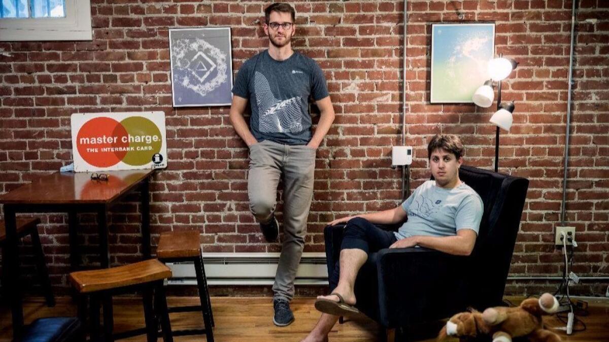 Andrew Deitrich, left, and Aaron Frank are two of the founders of Final, an Oakland credit card company that lets customers create "virtual" cards for use at online merchants.