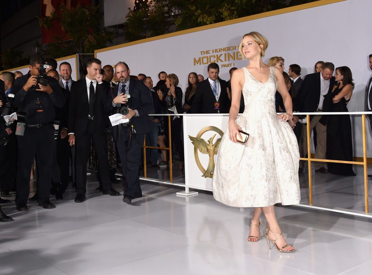 The Dior spokeswoman wears another dress from the French house for the L.A. premiere of "Mockingjay -- Part 1" on Nov. 17. The dress -- presented as a floor-length gown on the runway -- is shortened and styled with Aquazurra "Linda" heels and Vita Fede earrings.