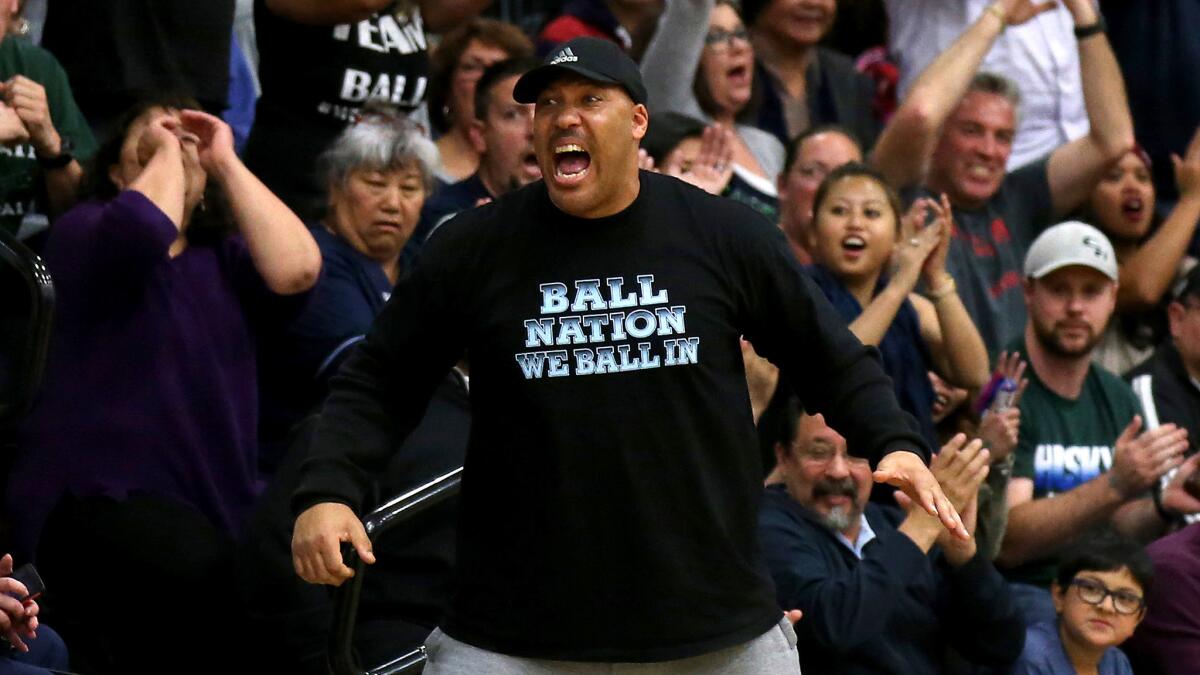 LaVar Ball cheers during a game last year when all three of his sons played together at Chino Hills High School.