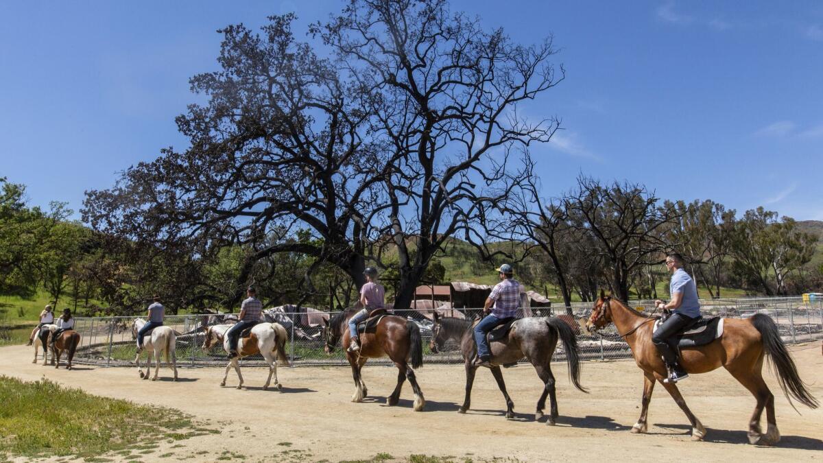 Horseback riders start down Coyote Canyon Trail at Paramount Ranch in Agoura Hills, part of the Santa Monica Mountains National Recreation Area.
