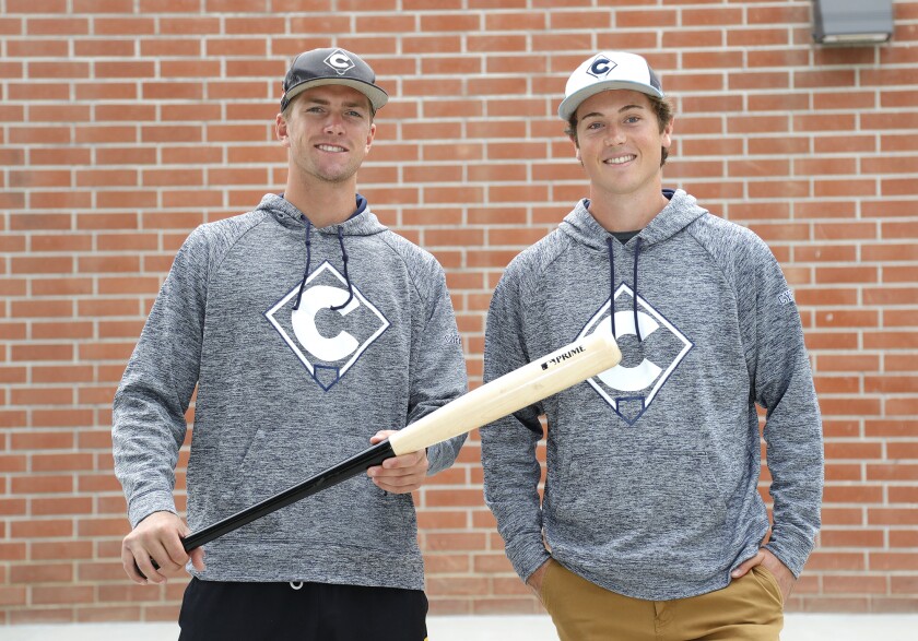 Cypress College baseball players Hayden Schott and Spencer Serven, from left, shown at Edison High on Monday.