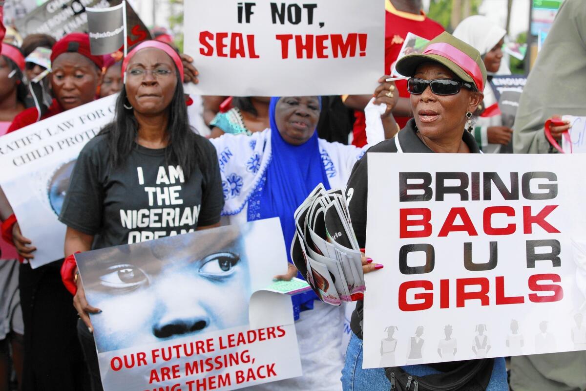 Women attend a demonstration in Lagos, Nigeria, calling on the government to rescue schoolgirls kidnapped by the radical Islamist group Boko Haram.