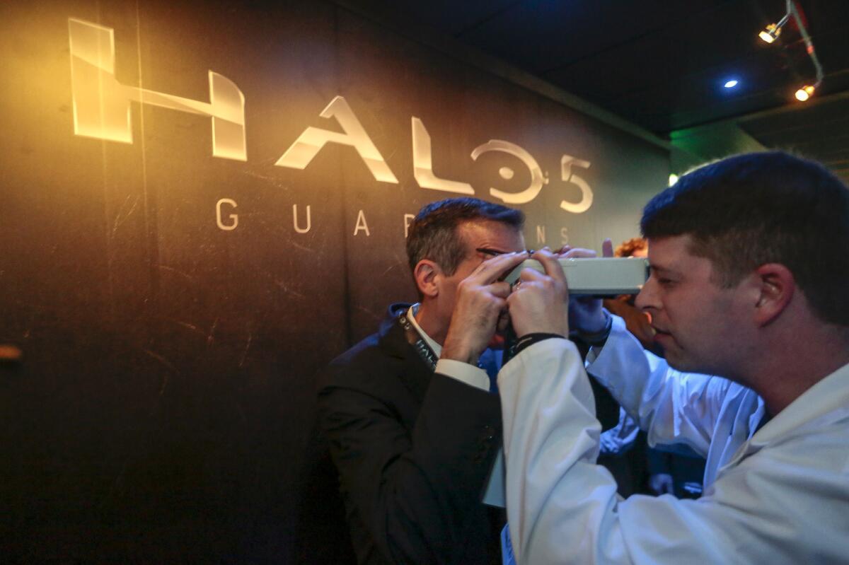 L.A. Mayor Eric Garcetti has his eyes measured before entering "Halo 5: Guardians," a virtual experience at the Microsoft Xbox exhibit at E3 in the Los Angeles Convention Center.