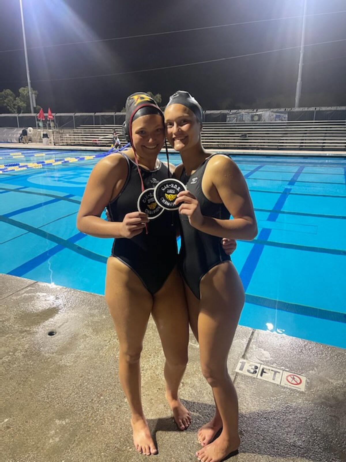 Alex and Julia Bonaguidi celebrate winning their third CIF championship together as teammates.