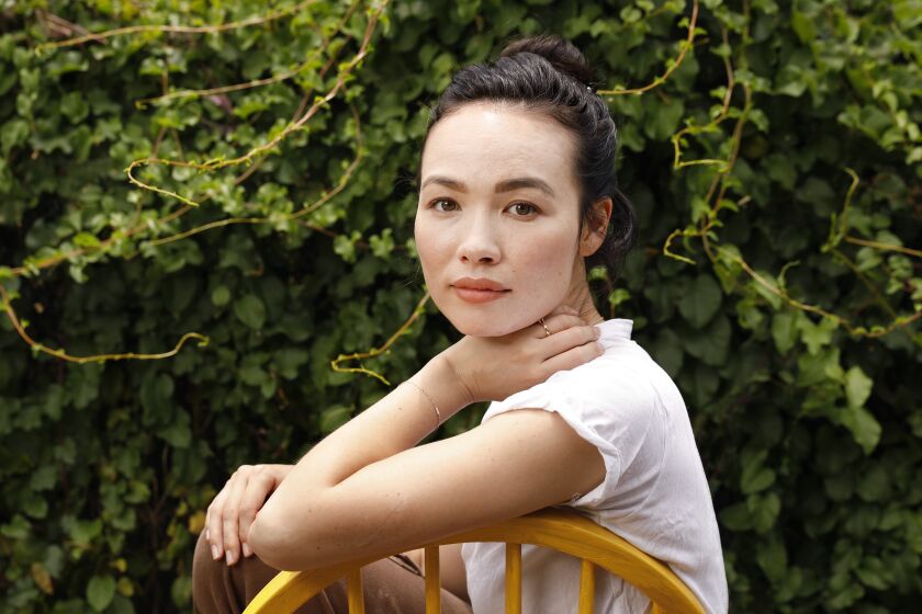PASADENA-CA-JUNE 16, 2020: Hanna-Lee Sakakibara, an actor and former dancer, is photographed at home in Pasadena on Tuesday, June 16, 2020. Sakakibara has been without work during the pandemic and is one of the performers in need who secured a $1000 grant from the SAG-AFTRA Foundation. (Christina House / Los Angeles Times)