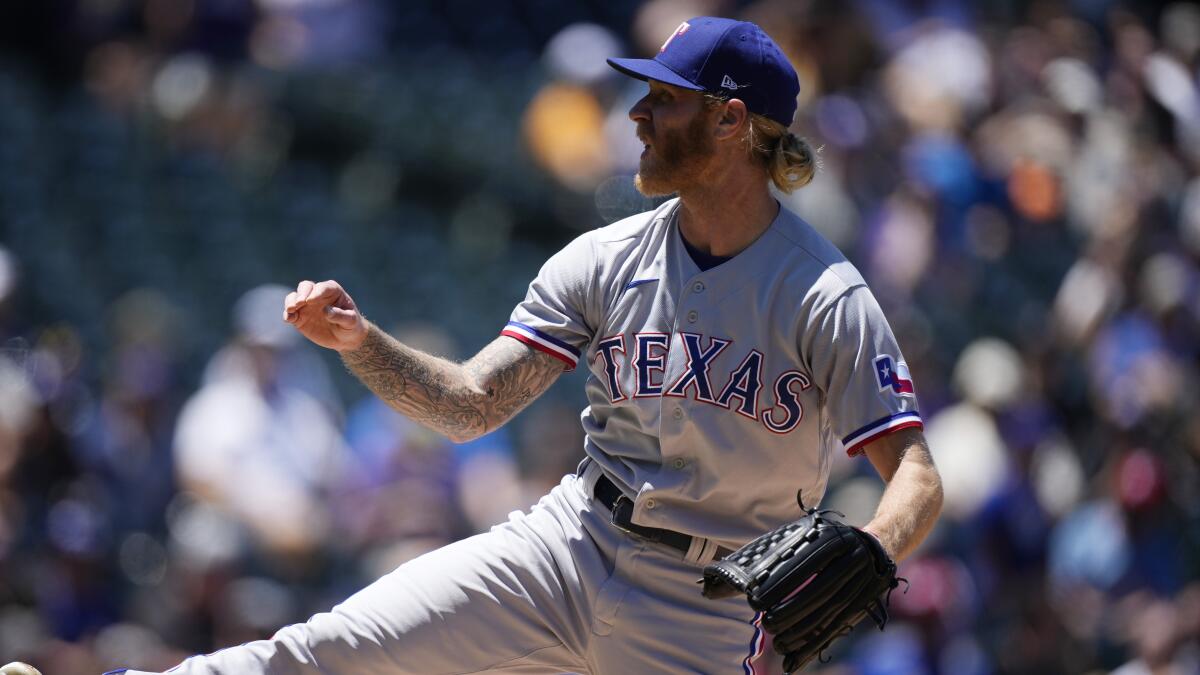 Texas Rangers starting pitcher Mike Foltynewicz delivers against the Colorado Rockies on June 3.