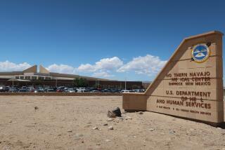 This Aug. 12, 2019 photo shows the Northern Navajo Medical Center in Shiprock, New Mexico. A federal audit released in July 2019 found the hospital was one of a handful run by the Indian Health Service that put Native American patients at increased risk for opioid abuse and overdoses. (AP Photo/Felicia Fonseca)