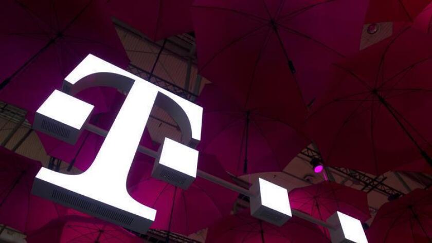 T-Mobile said it bought cable television start-up Layer3 TV to help it roll out its upcoming service.