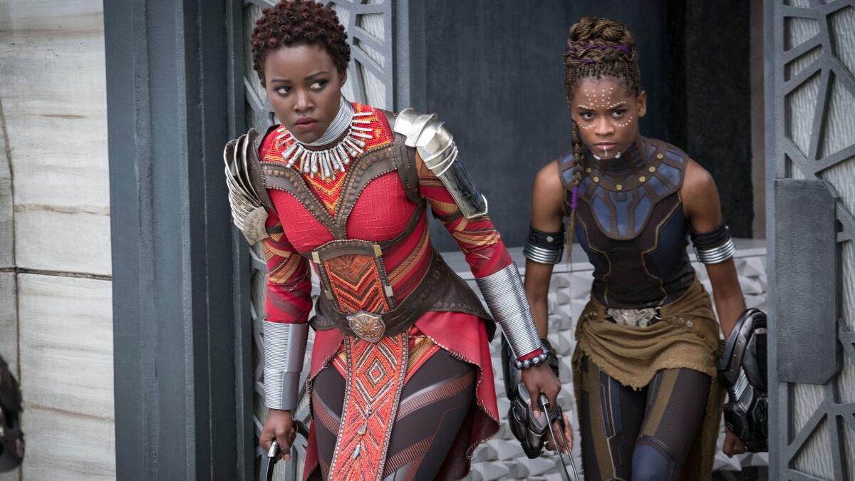 Nakia (Lupita Nyong'o), left, and Shuri (Letitia Wright) in "Black Panther."
