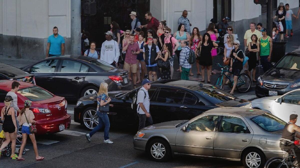 Mayor Eric Garcetti wants to add an artist to a team working on preventing pedestrians and cyclists from being killed on city streets. Pictured is the intersection of Hollywood and Highland Boulevards, which has one of the city's highest accident rates for pedestrians.