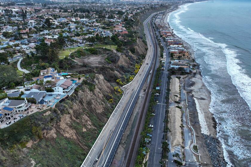Dana Point, CA, Wednesday, January 4, 2023 - Unstable cliffs loom over Pacific Coast Highway as heavy rains threaten to create road-closing landslides. (Robert Gauthier/Los Angeles Times)