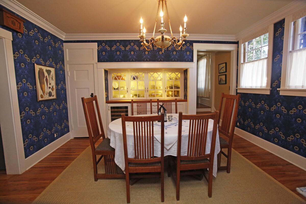 Architect Susan Masterman reconfigured an existing kitchen into this period-authentic Craftsman dining room, which has a dining table and chairs by Stickley.