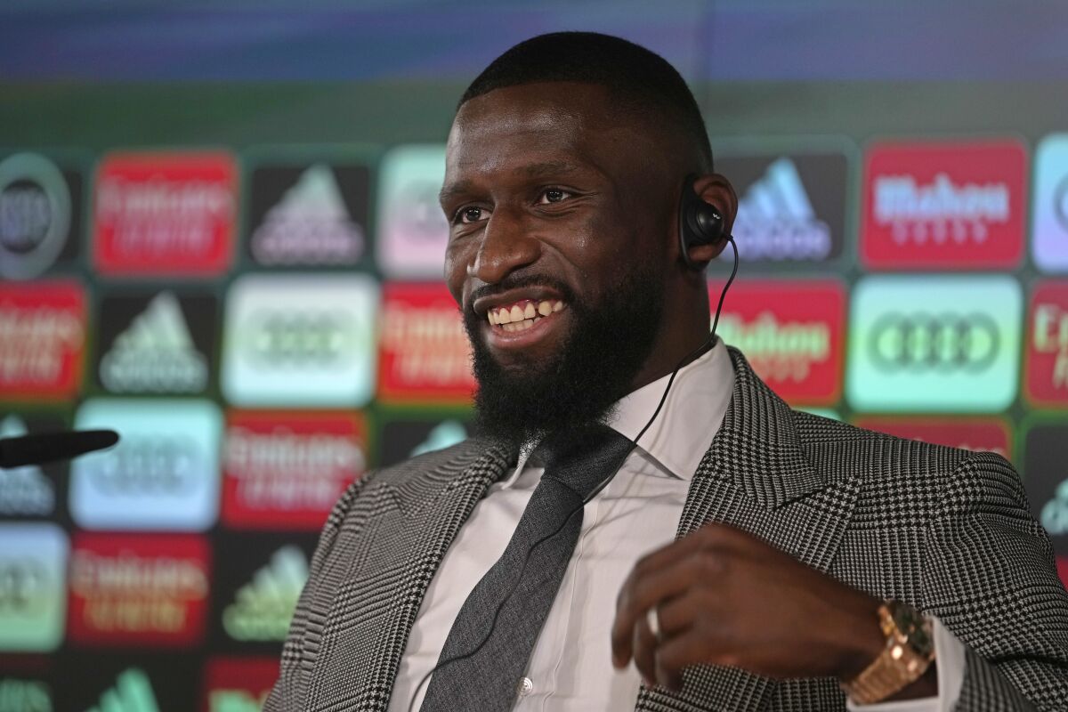Real Madrid's new signing Antonio Rudiger smiles before the start of a press conference at the club's training ground in Madrid, Spain, Monday, June 20, 2022. (AP Photo/Paul White)