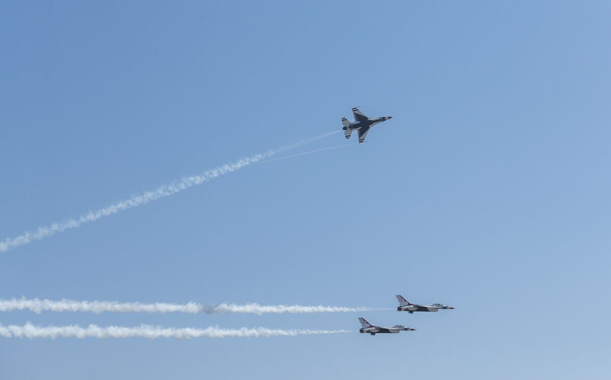 Members of the U.S. Air Force Thunderbirds fly over the Los Alamitos Joint Forces Training Base on Thursday.