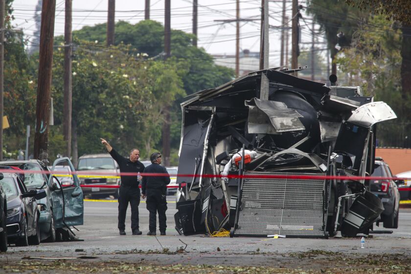 Los Angeles, CA - July 04: Investigation continues in a fireworks explosion that destroyed a LAPD's bomb squad vehicle last Wednesday at 700 block of East 27th Street on Sunday, July 4, 2021 in Los Angeles, CA. (Irfan Khan / Los Angeles Times)