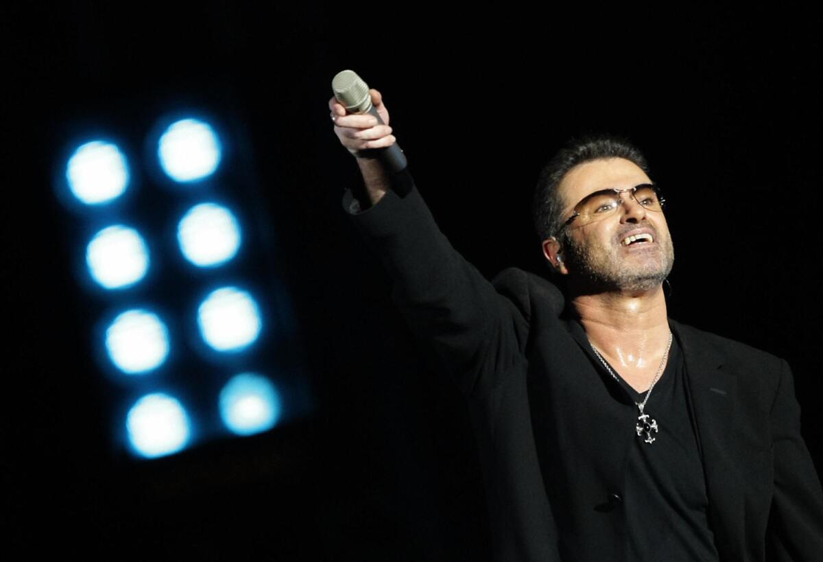 Legendary pop singer George Michael performs at the Zayed Sports City stadium in Abu Dhabi on Dec. 1, 2008.