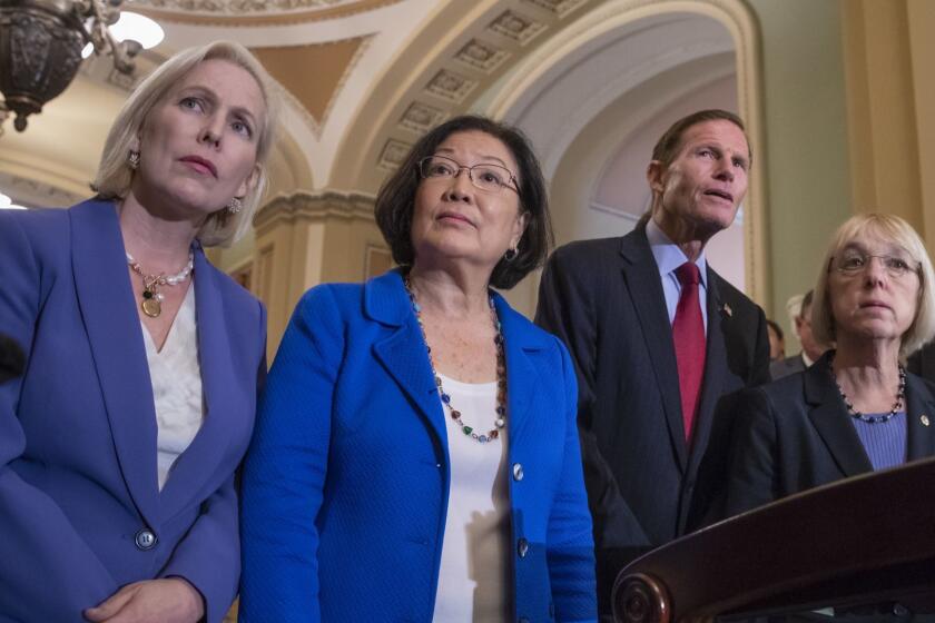 From left, Sen. Kirsten Gillibrand, D-N.Y., Sen. Mazie Hirono, D-Hawaii, Sen. Richard Blumenthal, D-Conn., and Sen. Patty Murray, D-Wash., assistant Senate minority leader, speak with reporters about Supreme Court nominee Brett Kavanaugh following their weekly policy meetings, at the Capitol in Washington, Tuesday, Sept. 18, 2018. (AP Photo/J. Scott Applewhite)