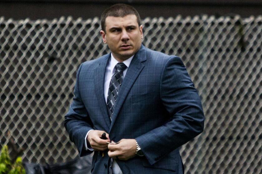 New York City Police Officer Daniel Pantaleo leaves his house May 13 in Staten Island, N.Y.