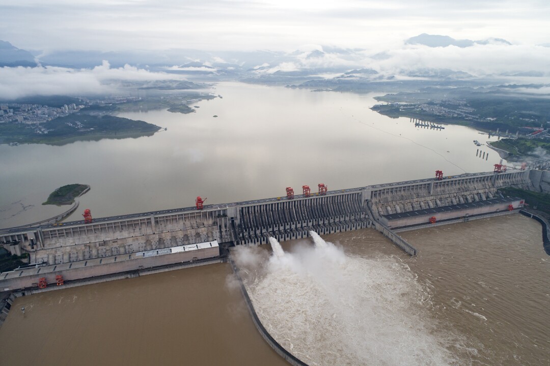 Water flows out from sluiceways at the Three Gorges Dam on the Yangtze River in central China.