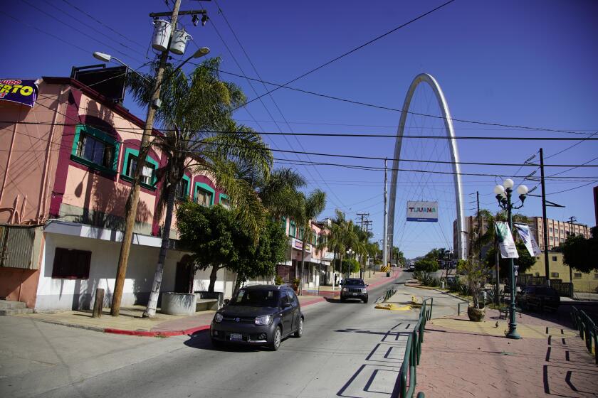 Tijuana remains on "red light" - the highest COVID-19 level of alert but the health secretary says Tijuana will be going to orange soon. June 18th, 2020 in Downtown Tijuana. The Tijuana's Monumental Arch is the entrance to the downtown area of the city.