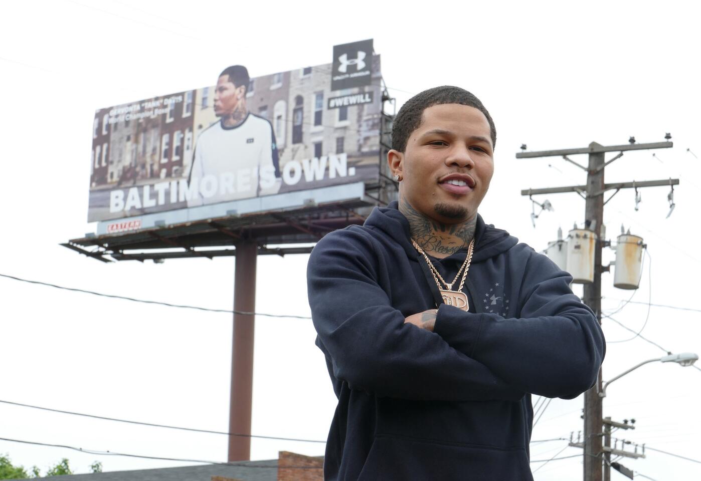 Baltimore native and IBF junior lightweight champion Gervonta "Tank" Davis stands on Interstate 95 with his Under Armour billboard in the background. Under Armour signed the Baltimore native Davis to its roster of athletes.