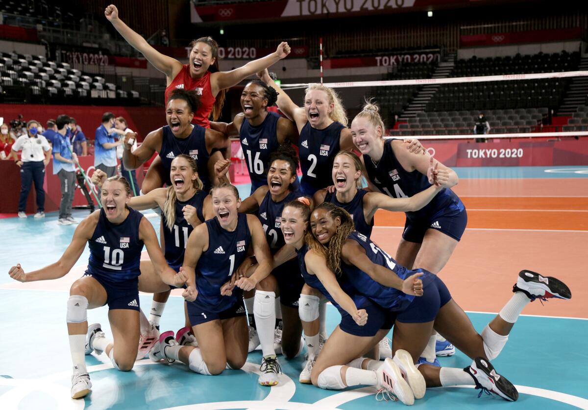 U.S. women's volleyball team celebrates after semifinal win