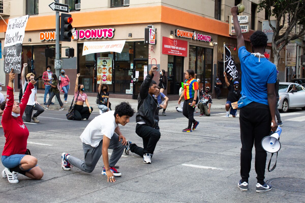 Sabrina Webb, who is Michael Brown's cousin, leads a protest through downtown Los Angeles.