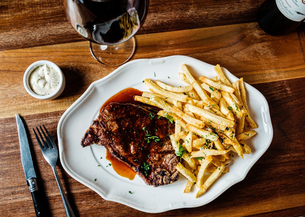 The Smoking Goat's classic steak frites is a 14-ounce bone-in New York strip with duck fat fries. Pair it with a red (perhaps a Charles Joguet cabernet france from Chinon?) from the restaurant's well-curated wine list. 